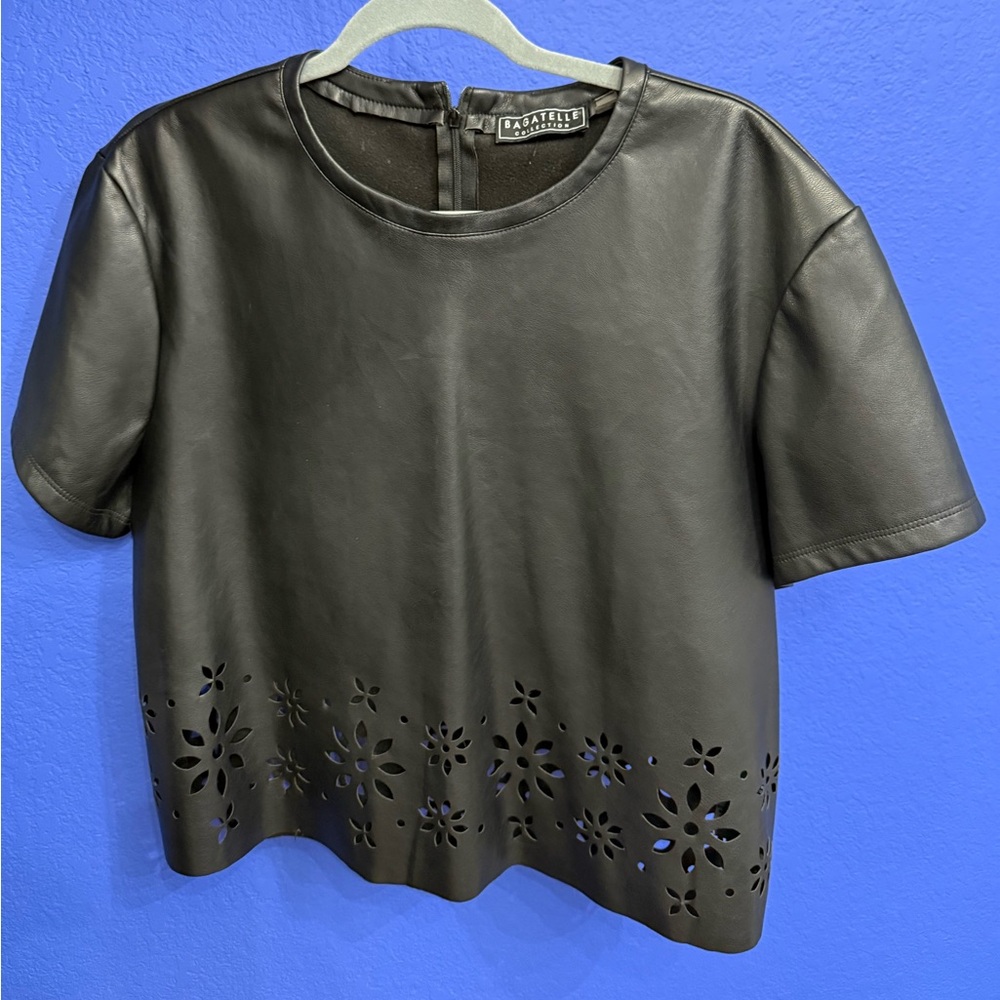 Black faux leather top with laser cut detail